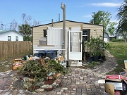 29-Back of small shed, outdoor shower, burn items in burn pit, boxes to be burned
